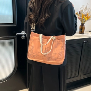 Retro orange tote bag with bamboo print and adjustable shoulder strap for women