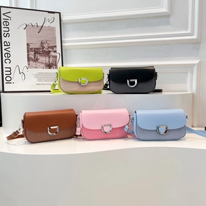 Minimalist crossbody messenger bags in five colors with textured fabric and D-ring buckles
