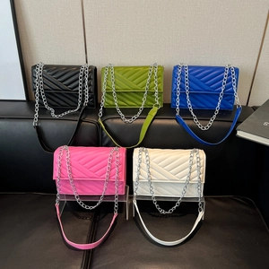 Chic quilted chevron crossbody bags with silver chain straps in five vibrant colors