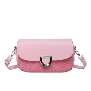 Pink leather and red twill flap crossbody bag with a silver D-ring buckle