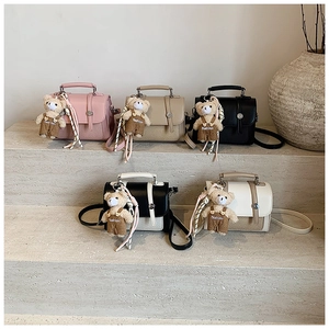 Crossbody satchel bags in five colors with woven texture and plush bear charms
