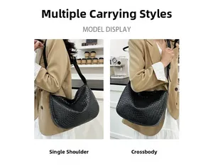 Detail showing versatile shoulder and crossbody styling of the black woven hobo bag