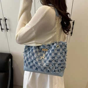 Large blue and white plaid denim tote bag with gold chain strap and deer charm