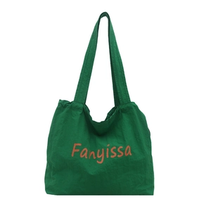 Deep green nylon tote bag with orange lettering and drawstring, large capacity shoulder bag