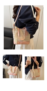 Detail of woven straw bucket bag featuring pink leather trim and lace scarf decoration