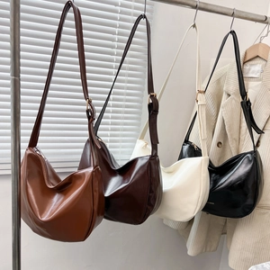Minimalist hobo shoulder bags in multiple colors with adjustable golden buckle straps