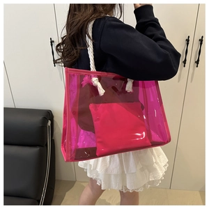 Transparent pink PVC tote bag with thick cotton rope handles and internal storage pouch