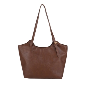 Brown faux leather tote bag with long shoulder straps and gold buckle detail for daily use