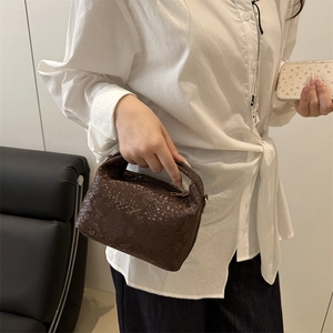 Retro dark brown snake pattern pillow handbag with a stylish minimalist top handle design