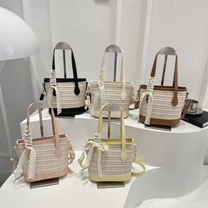 Chic woven straw bucket bag with lace bow handle in five vibrant colors for women