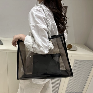 Transparent black PVC tote bag with white rope handles and black inner pouch