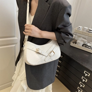 Chic white faux crocodile leather shoulder bag with gold buckles for stylish women