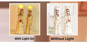 Groom and bride skeleton LED candles showing light on and off effects for Halloween