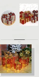 Close-up of lighted Christmas gift boxes with glitter finish and decorative bows