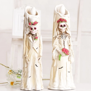 Halloween skull couple LED candles featuring groom and bride skeleton figures with realistic flames