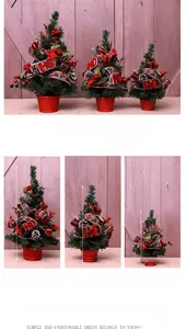 Three sizes of mini Christmas trees with red berry clusters and plaid bows on tabletop