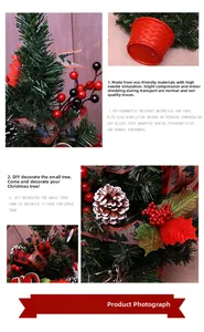 Detail view of mini Christmas tree with red berries, pine cones, and tartan bow ornament