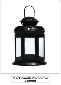 Macro detail of black metal candle lantern featuring star-shaped cutouts and top ring
