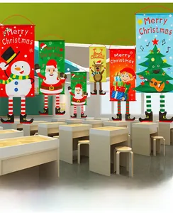 Detail of colorful non-woven Christmas banners with Santa, deer and snowman designs