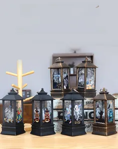 Close-up of Halloween LED lanterns with mummy, pumpkin, and skull prints in retro finishes