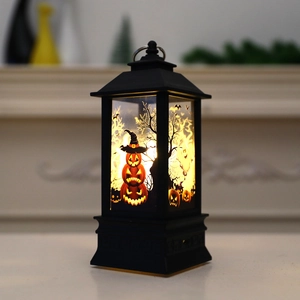 Halloween LED lantern with pumpkin and ghost prints emitting a warm orange holiday glow