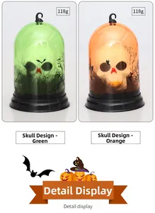 Detail of Halloween LED lantern with hanging hook featuring skull and bat silhouettes