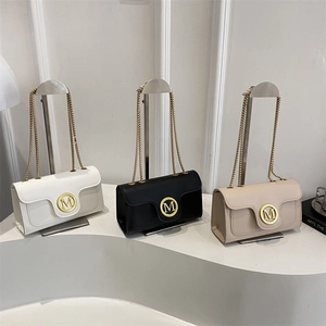 Chic quilted chain crossbody bags in white, black and beige with gold M buckle detail