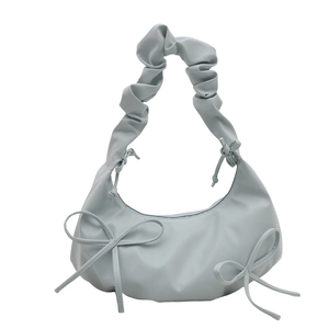 Light blue pleated hobo bag with bow details and ruched handle for 2025 summer fashion