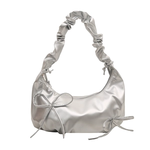 Silver metallic pleated cloud bag with bow drawstrings and ruched shoulder strap