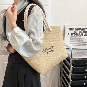 Handmade woven straw tote bag with Fashion xing embroidery and rope handles for summer