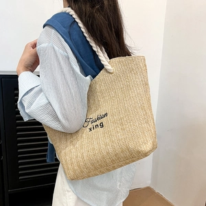 Large beige woven straw tote bag with cotton rope handles and Fashion embroidery