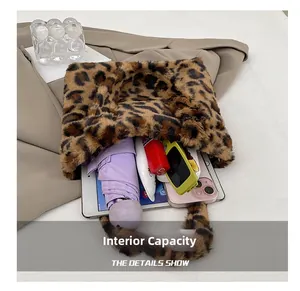 Internal capacity of leopard plush tote showing space for umbrella and tablet