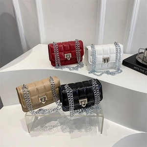 Quilted mini crossbody chain bags in glossy laser finish, set of four elegant colors