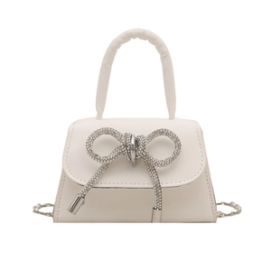 Mini sac à main blanc pour femme avec nœud en strass et bandoulière en chaîne argentée