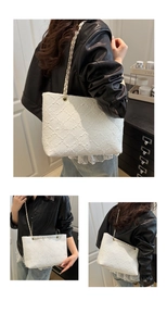 Three views of a white tweed shoulder bag with gold chain strap on a black leather jacket
