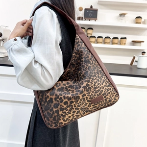 Chic leopard print shoulder bag with large capacity and dark brown trim details