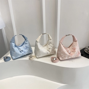 Lace butterfly shoulder bags in blue, white, and pink with adjustable straps