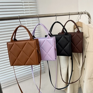 Quilted tote bags set in four colors with minimalist large diamond pattern design
