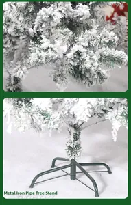 Detail of flocked Christmas tree branches with snow effect and sturdy metal stand support