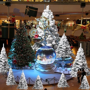 White flocked artificial Christmas tree with faux snow and metal stand in multiple sizes