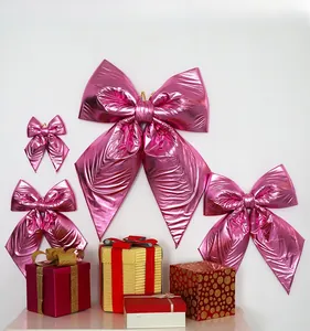 Pink metallic decorative bows in four sizes for holiday gift wrapping and event decor