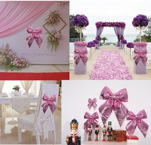 Pink metallic wedding bows in various sizes used for ceremony backdrops and chair decor