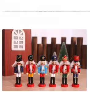 Set of 6 handcrafted wooden nutcracker ornaments with festive gold cords for Christmas trees