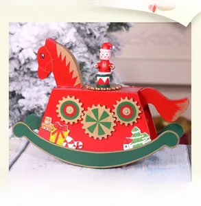 Detail of wooden Christmas rocking horse music box with holiday ornaments and characters