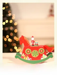 Detail of wooden Christmas rocking horse music box with Santa Claus and festive gears