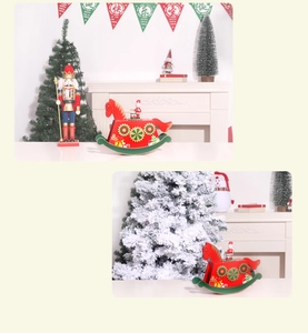 Detailed view of a red wooden Christmas rocking horse music box with Santa on a mantel