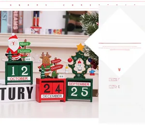 Close-up of wooden Christmas countdown calendar with Santa and reindeer figurines