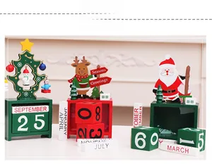 Macro detail of wooden Christmas countdown calendar with Santa, Reindeer, and Tree figurines