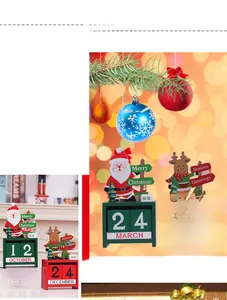 Detail of wooden Christmas countdown calendar with Santa and reindeer desktop ornaments