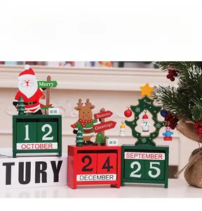 Detailed view of handmade wooden Christmas advent calendars with reindeer and santa motifs